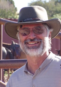 Mark by horse corral (took granddaughter riding for her birthday