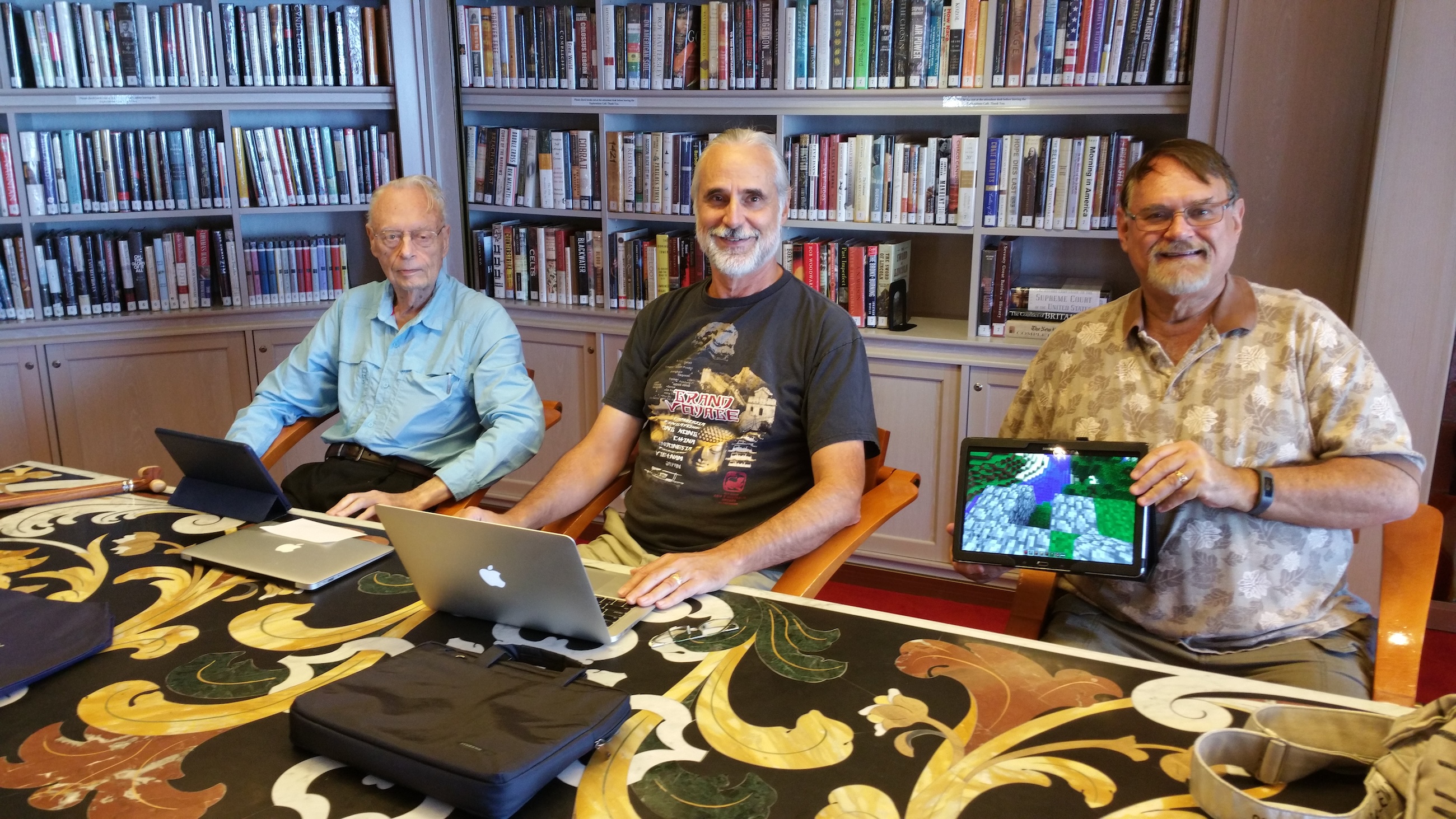 Dad, Mark, and Ron in the ship's library, on the way to Hawaii